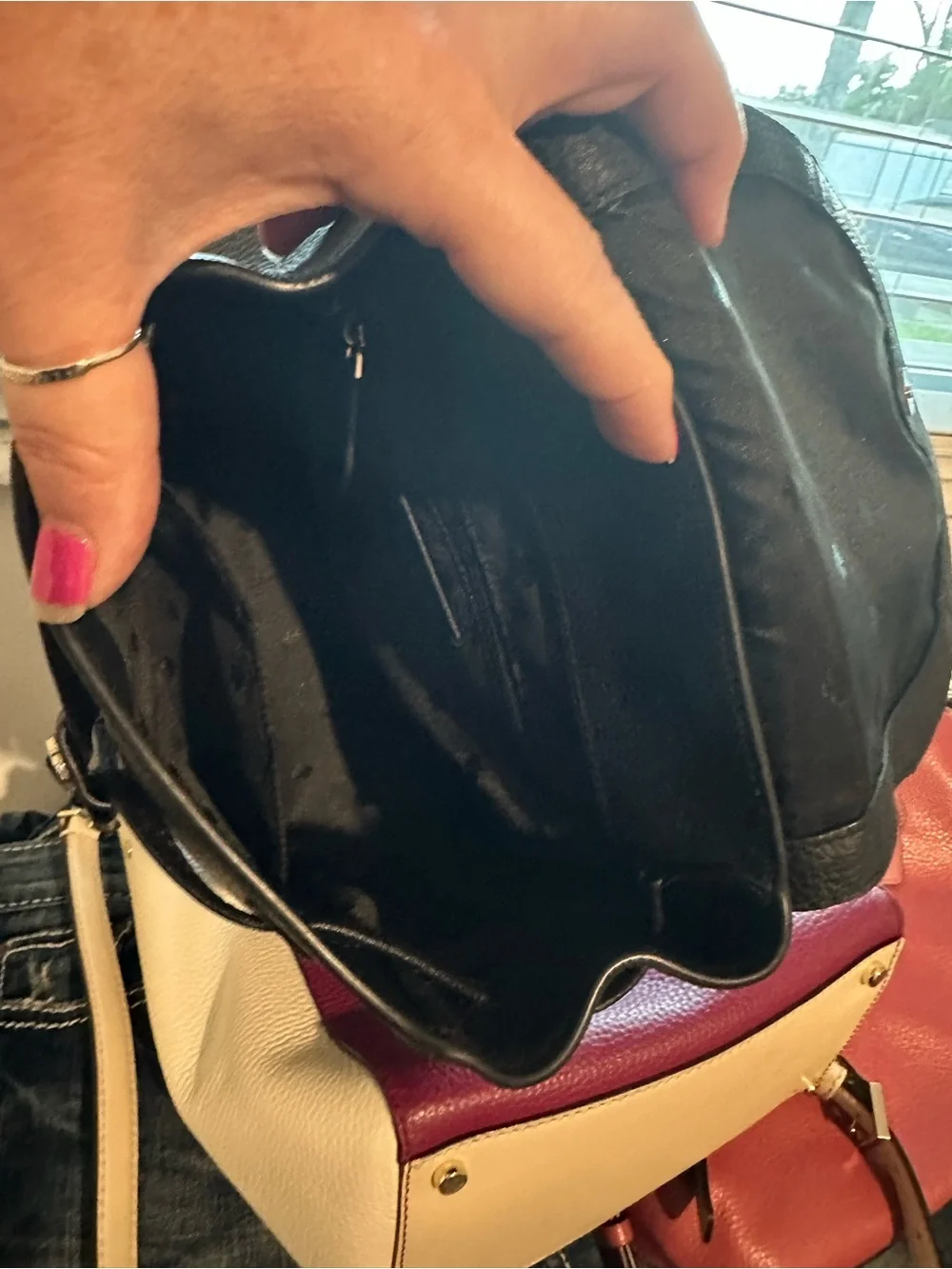 kate spade black pebbled leather drawstring backpack